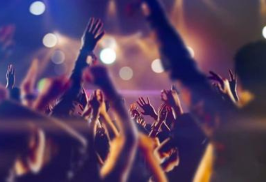 lots of people with hands in the air
