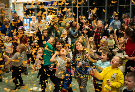 Children playing in confetti